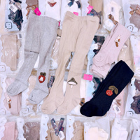 Quần tất đính nơ