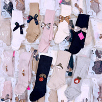 Quần tất đính nơ