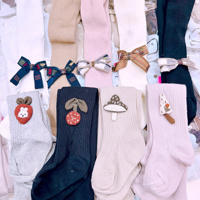 Quần tất đính nơ